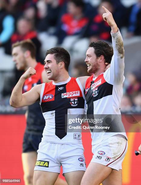 Jade Gresham and Jack Steven of the Saints celebrate a goal during the round 15 AFL match between the Melbourne Demons and the St Kilda Saints at...