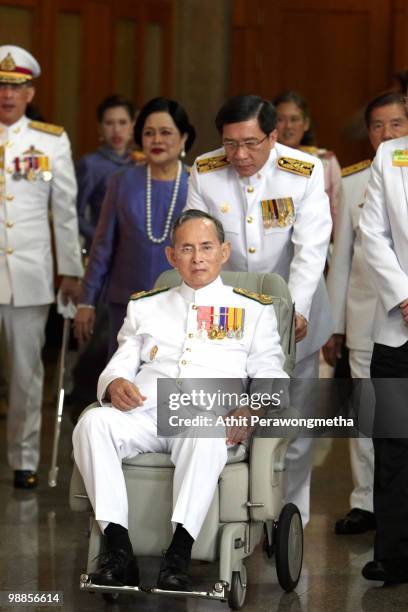 Thai King Bhumibol Adulyadej arrives at Siriraj Hospital after he marks the 60th anniversary of his coronation at the Grand Palace on May 5, 2010 in...