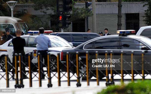 Limousine drives with a diplomatic motorcade entering Diaoyutai State Guest House in Beijing on May 5, 2010. North Korea's leader Kim Jong-Il was...