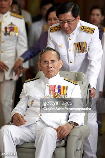 Thai King Bhumibol Adulyadej arrives at Siriraj Hospital after he marks the 60th anniversary of his coronation at the Grand Palace on May 5, 2010 in...