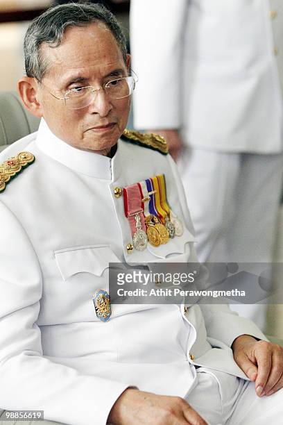 Thai King Bhumibol Adulyadej arrives at Siriraj Hospital after he marks the 60th anniversary of his coronation at the Grand Palace on May 5, 2010 in...