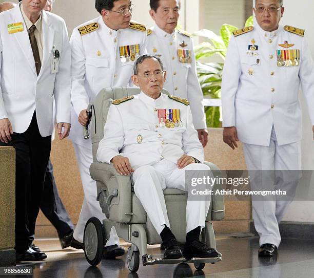 Thai King Bhumibol Adulyadej arrives at Siriraj Hospital after he marks the 60th anniversary of his coronation at the Grand Palace on May 5, 2010 in...