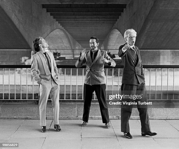 Ian Craig Marsh, Martyn Ware and Glenn Gregory of Heaven 17 pose for a group portrait session by the Thames at Embankment on March 31st 1981 in...