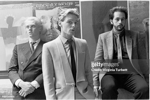 Glenn Gregory, Ian Craig Marsh and Martyn Ware of Heaven 17 pose for a group portrait session by the Thames at Embankment on March 31st 1981 in...