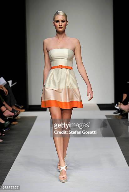 Model showcases designs by Jayson Brunsdon on the catwalk on the third day of Rosemount Australian Fashion Week Spring/Summer 2010/11 at the Overseas...