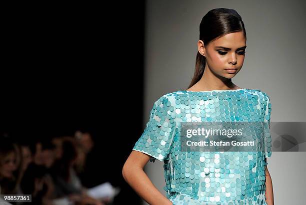 Model Samantha Harris showcases designs by Jayson Brunsdon on the catwalk on the third day of Rosemount Australian Fashion Week Spring/Summer 2010/11...