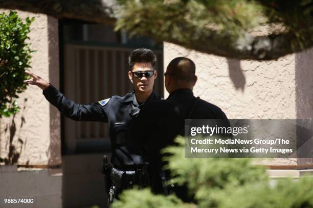 San Jose Police Department investigate a scene at an apartment complex along Camden Avenue in San Jose, Calif., where an occupant apparently killed...
