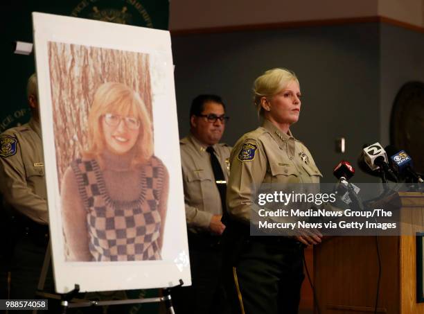 Santa Clara County Sheriff Laurie Smith speaks to the media about the 1974 killing of Arlis Perry, photograph at left, at the Sheriff's office in San...