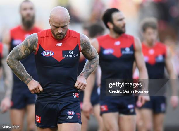 Nathan Jones of the Demons looks dejected after losing the round 15 AFL match between the Melbourne Demons and the St Kilda Saints at Melbourne...