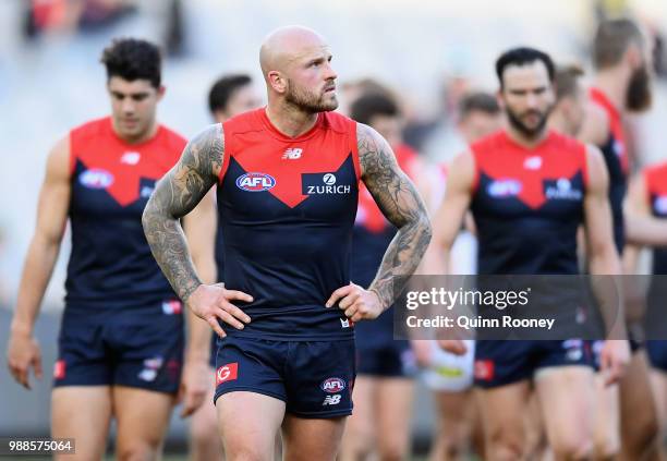 Nathan Jones of the Demons looks dejected after losing the round 15 AFL match between the Melbourne Demons and the St Kilda Saints at Melbourne...