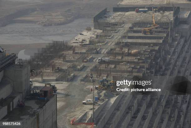 Building site machines stand on the construction site of the Grand Ethiopian Renaissance Dam in Guba in the North West of Ethiopia, 24 November 2017....