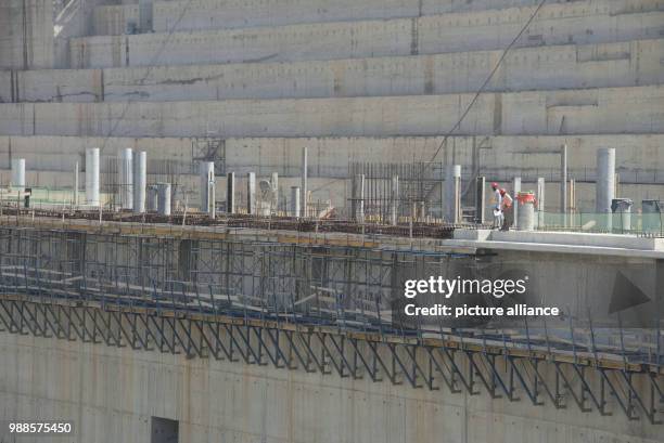Building site machines stand on the construction site of the Grand Ethiopian Renaissance Dam in Guba in the North West of Ethiopia, 24 November 2017....