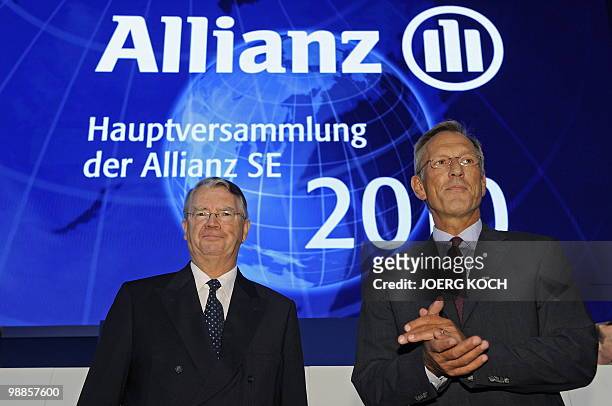 Michael Diekmann , chairman of German insurance giant Allianz, and supervisory board chairman Henning Schulte Noelle pose for photographers at the...