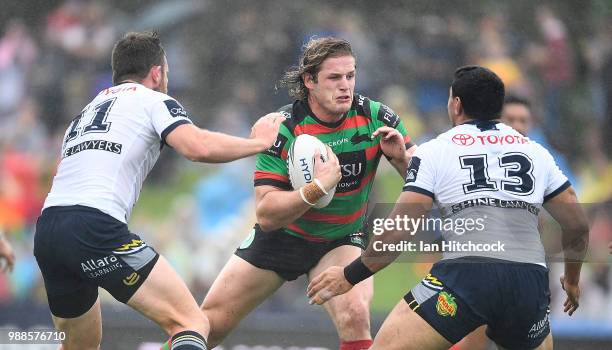 George Burgess of the Rabbitohs looks to get past Jason Taumalolo of the Cowboys during the round 16 NRL match between the South Sydney Rabbitohs and...