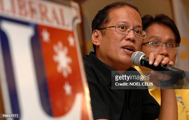 Liberal Party standard bearer Benigno 'Noynoy' Aquino , son of democracy icon Corazon Aquino, with his running mate Manuel Roxas answers a question...