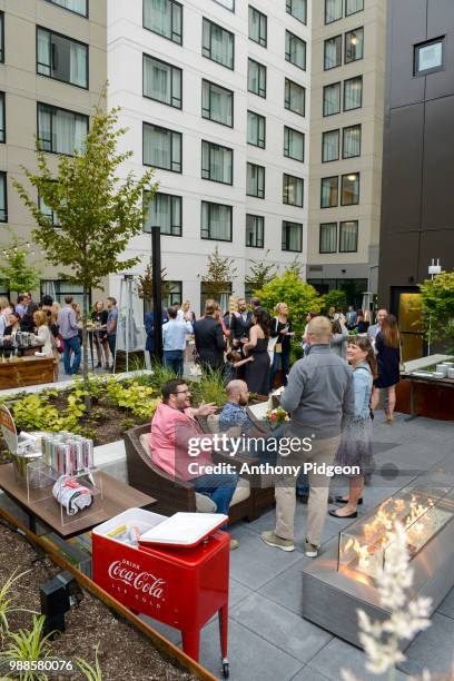 Guests enjoying the Grand Opening Event, EVEN Hotel and Staybridge Suites Seattle on June 28, 2018 in Seattle, Washington.