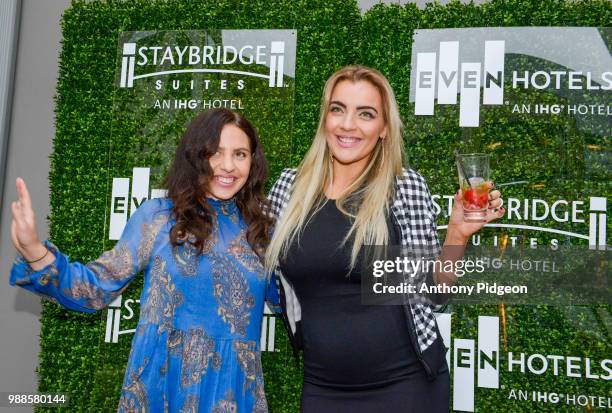 Guests enjoying the Grand Opening Event, EVEN Hotel and Staybridge Suites Seattle on June 28, 2018 in Seattle, Washington.