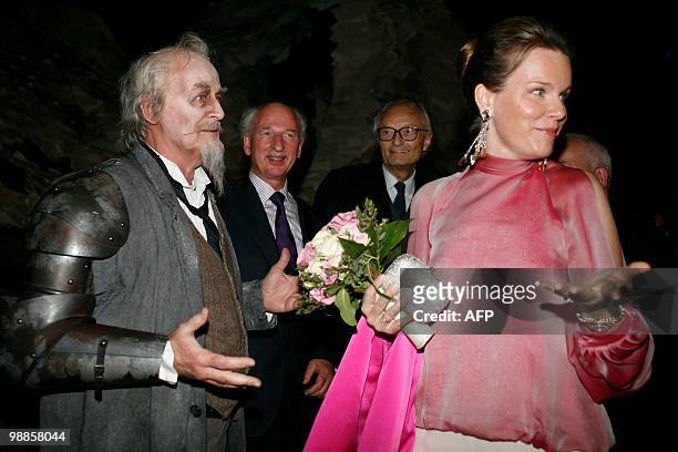 Princess Mathilde of Belgium and Belgian opera singer Jose Van Dam gesture towards an unseen person as Belgian Astronaut Dirk Frimout and Count...