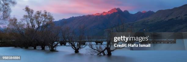 sunset over lake, glenorchy, new zealand - hafiz ismail stock pictures, royalty-free photos & images