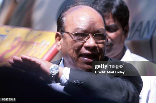 Defense lawyer K.P. Pawar waves arrives at the the special court set up for the trial of Mohammad Ajmal Kasab, the lone surviving gunman of the...