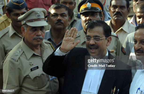 Public prosecutor Ujjwal Nikam smiles as he speaks with media outside the special court set up for the trial of Pakistani Mohammed Ajmal Kasab in...
