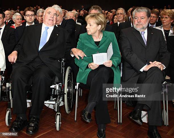Former German Chancellor Helmut Kohl, German Chancellor Angela Merkel and Kurt Beck, governor of the German federal state of Rhineland-Palatinate,...
