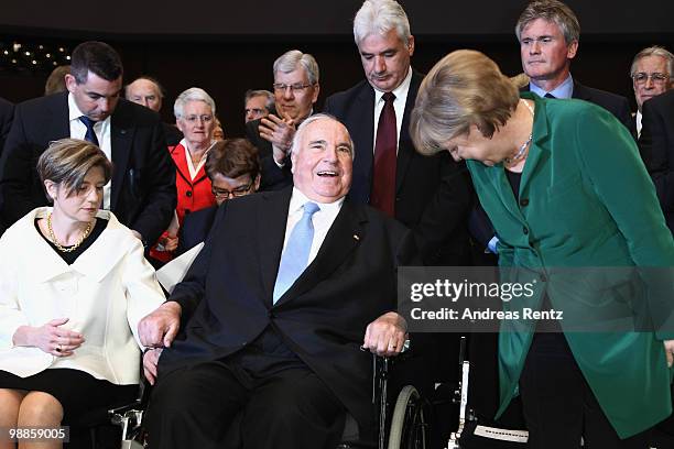 Maike Kohl-Richter, former German Chancellor Helmut Kohl and German Chancellor Angela Merkel attend an official birthday reception to former German...