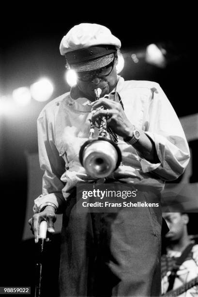 Miles Davis performs live on stage at the North Sea Jazz festival at the Hague, Holland on July 10 1984. Darryll Jones behind on bass