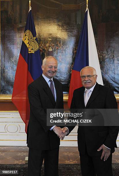 Czech Republic's President Vaclav Klaus shakes hand with Prince Hans-Adam II of Liechtenstein on May 5, 2010 at Prague Castle in Prague. AFP...