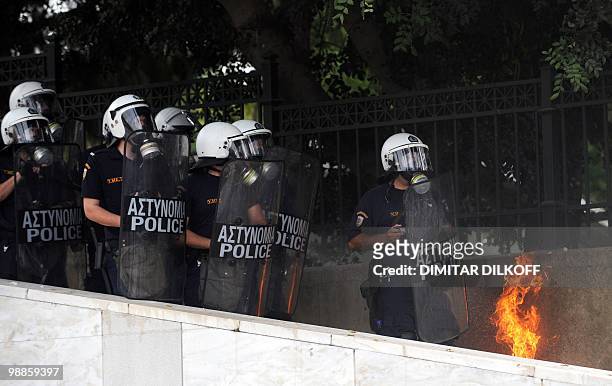 Greek riot policemen clash with protestors in the centre of Athens on May 5, 2010. A nationwide general strike gripped Greece in the first major test...
