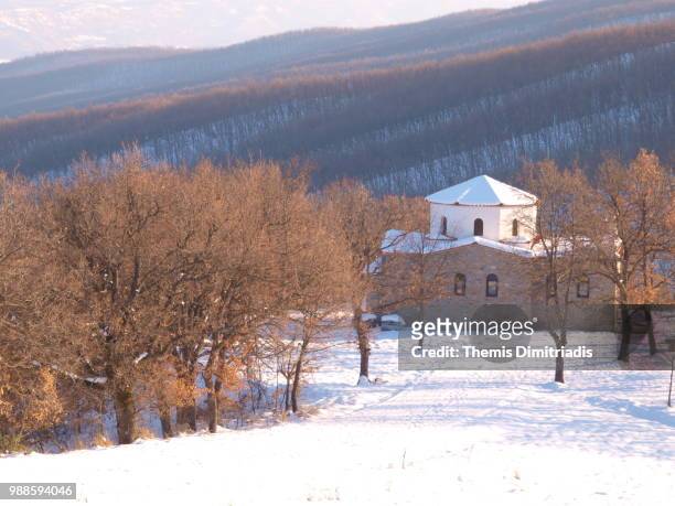 old stone church in snow - themis stock pictures, royalty-free photos & images