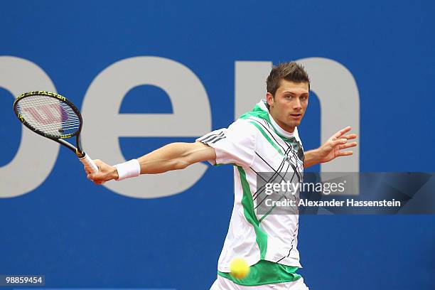 Daniel Brands of Germany plays a backhand during his match against Philipp Kohlschreiber of Germany at day 4 of the BMW Open at the Iphitos tennis...