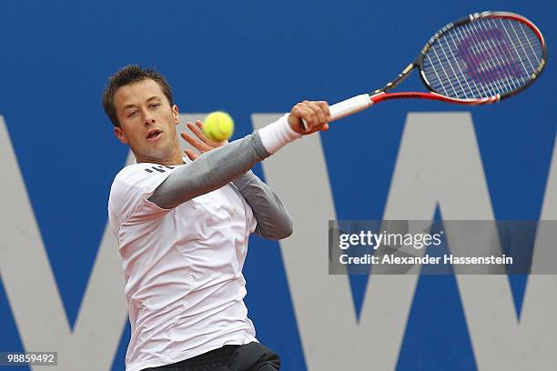 Philipp Kohlschreiber of Germany plays a backhand during his match against Daniel Brands of Germany at day 4 of the BMW Open at the Iphitos tennis...