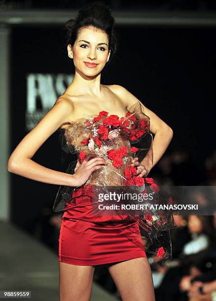 Model presents a creation by Macedonian designer Elena Luka during the fashion weekend in Skopje late on March 13, 2010. AFP PHOTO/ ROBERT ATANASOVSKI