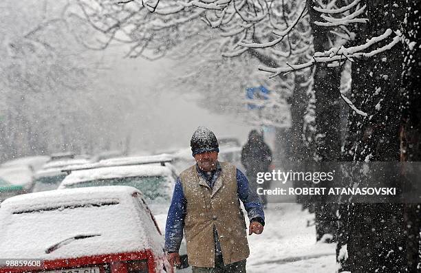 Man walks in snowy the streets of Skopje on March 8, 2010. Heavy snow fall and low temperatures have hit the Balkan countries including Macedonia,...