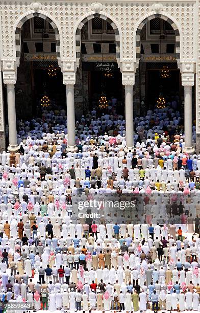 Muslim worshippers perform the first Friday prayer during the fasting month of Ramadan in the Saudi holy city of Mecca on August 28, 2009. Saudi...