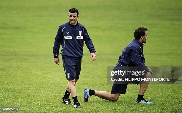 Italy's forwards Antonio Di Natale walks by Alberto Gilardino during a training session of the italian national team on the outskirts of Rome on May...