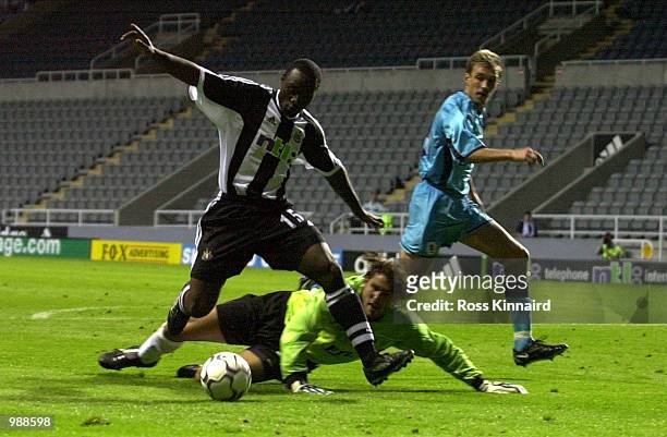 Lomana Lulalua of Newcastle scores the second goal during the Intertoto Cup tie between Newcastle United and 1860 Munich at St James'' Park...