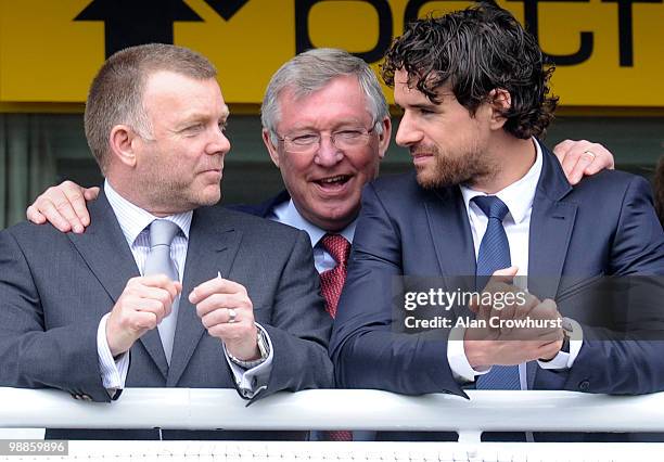 Sir Alex Ferguson enjoys the day with Owen Hargreaves and a Manchester United coach at Chester racecourse on May 05, 2010 in Chester, England