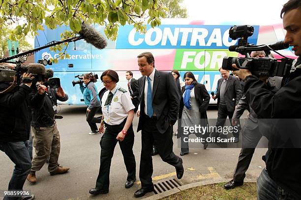 David Cameron , the leader of the Conservative party, arrives to meet workers at Dudley Ambulance Station on May 5, 2010 in Dudley, England. The...