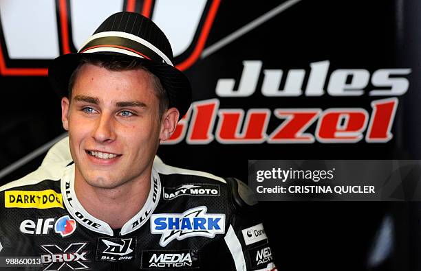 Forward Racing's French Moto 2 rider Jules Cluzel sits in the pits during a free practice session at Jerez de la Frontera's circuit on April 30,...