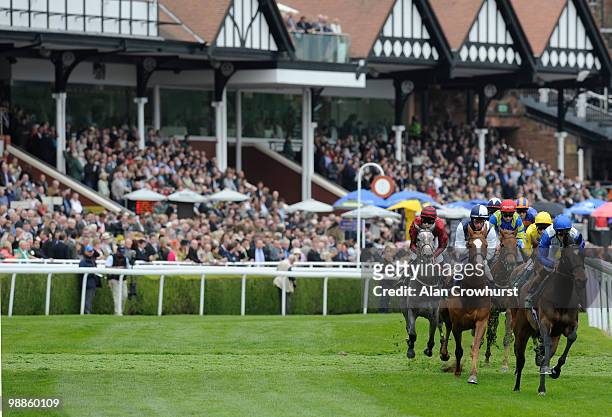 Gertrude Bell and William Buick turn away from the stands before winning The Weatherbys Bank Cheshire Oaks at Chester racecourse on May 05, 2010 in...