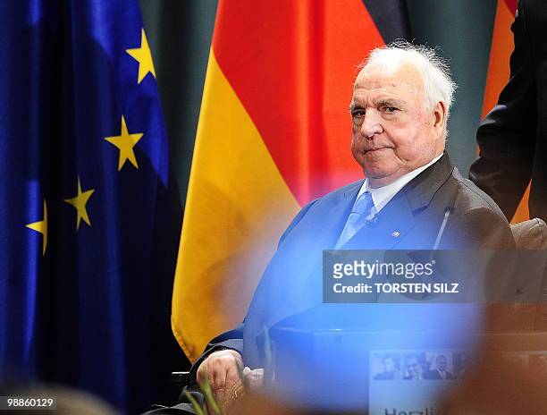 Former German chancellor Helmut Kohl is wheeled away after addressing guests during his official birthday reception in his hometown of Ludwigshafen...