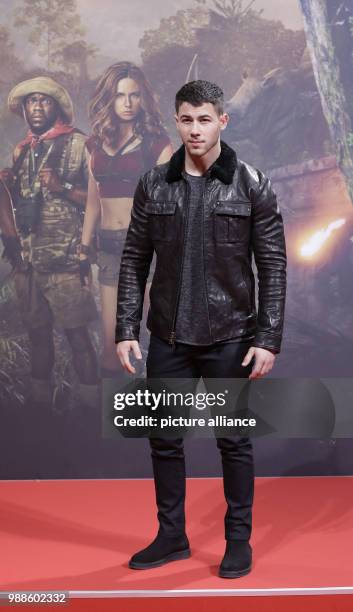 The actor Nick Jonas attends the German premiere of the movie 'Jumanji: Welcome to the Jungle' in Berlin, Germany, 06 December 2017. Photo: Jörg...