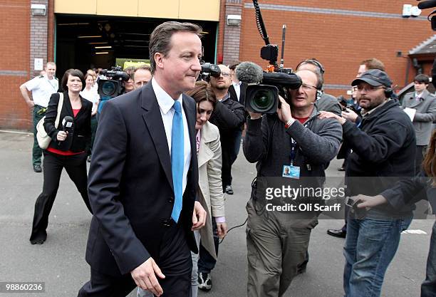 Conservative Party leader David Cameron leaves after meeting workers at Dudley Ambulance Station on May 5, 2010 in Dudley, England. The leaders of...