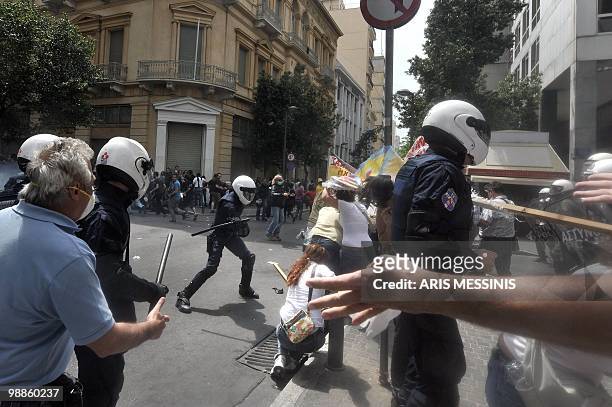 Greek riot policemen clash with protestors in the center of Athens on May 5, 2010. Athens police chiefs mobilized all their forces, including those...