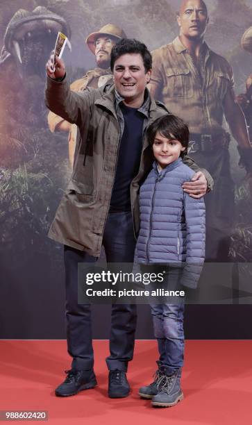 Shan Rahimkhan and his son Kian attend the German premiere of the movie 'Jumanji: Welcome to the Jungle' in Berlin, Germany, 06 December 2017. Photo:...