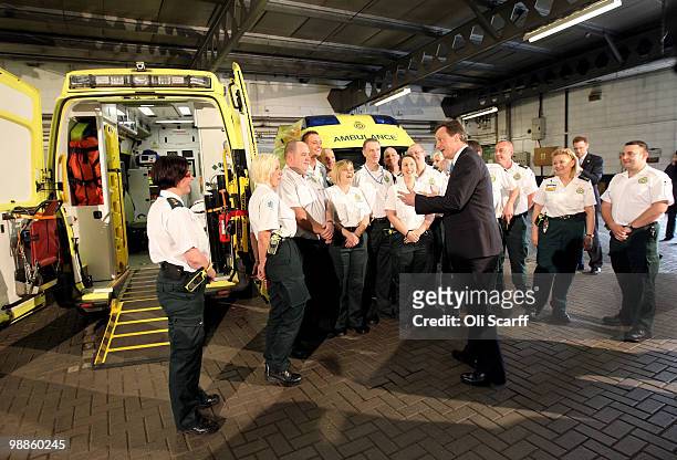 Conservative Party leader David Cameron meets workers at Dudley Ambulance Station on May 5, 2010 in Dudley, England. The leaders of all political...