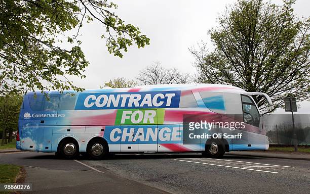 Conservative Party battle bus carrying leader David Cameron leaves Dudley Ambulance Station after a visit to meet staff there on May 5, 2010 in...