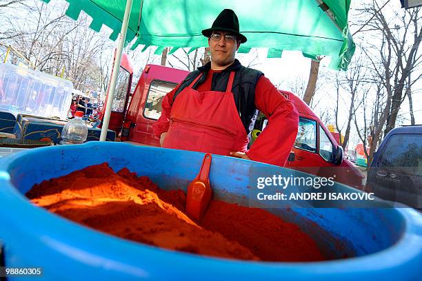 Man sells chilli paprika powder at an annual public fair in the village of Sakule, 40 kms , north of the Serbian capital Belgrade on March 20, 2010....